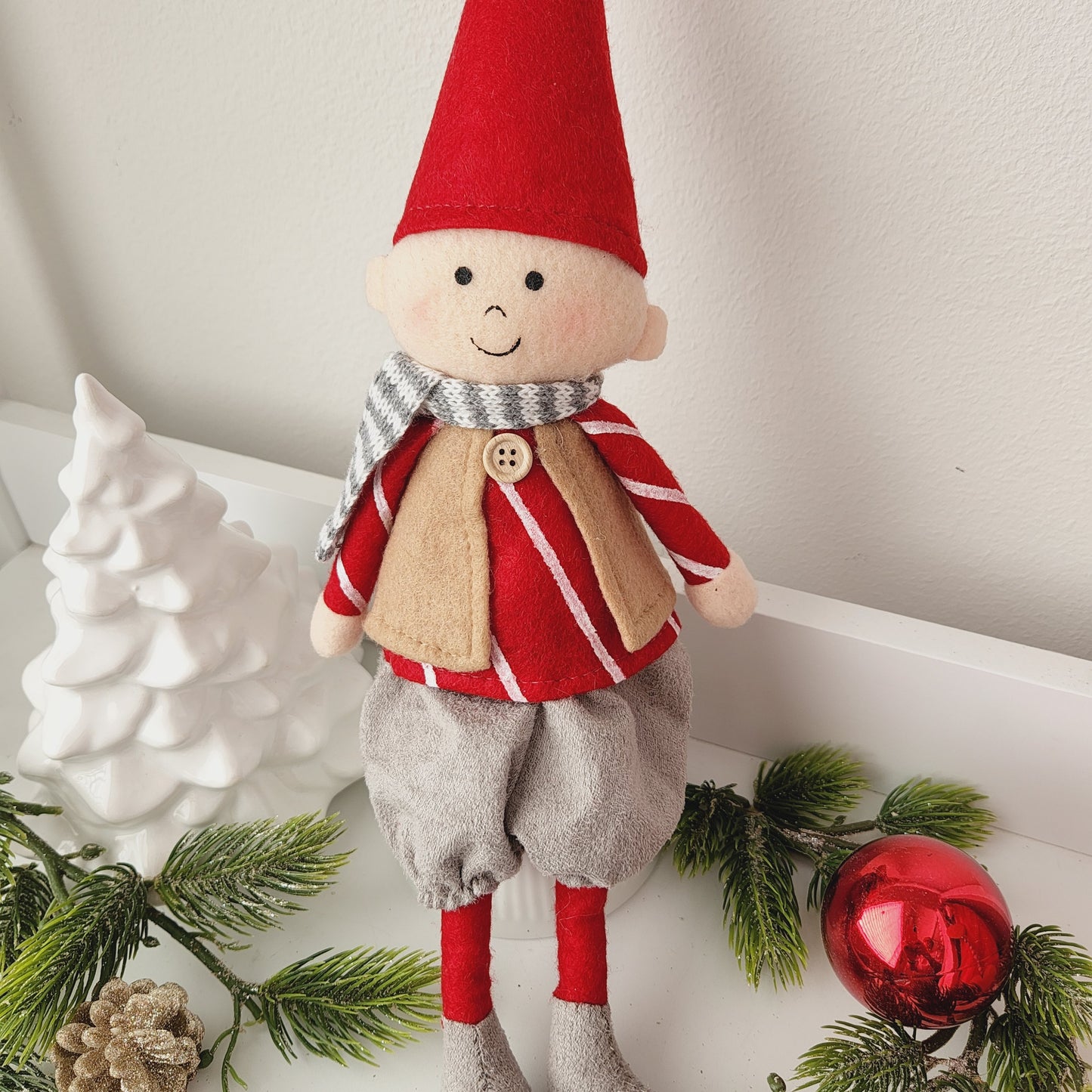 Christmas Boy Sitting with Beige Vest